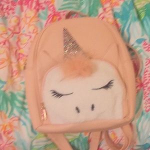 Adorable medium size unicorn fuzzy bag